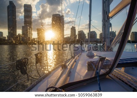 Sailboat and seascape with city skyline at distant, Toronto, Canada
