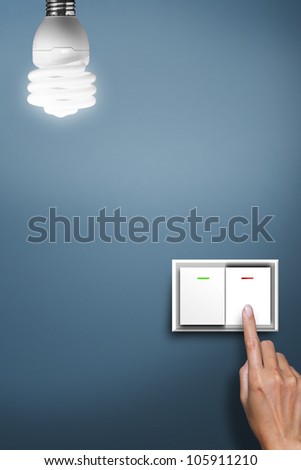 hand pressed to switch to turn off the light. Royalty-Free Stock Photo #105911210