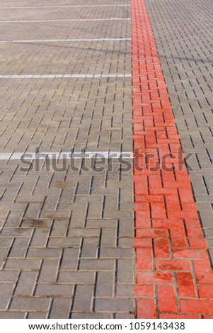sidewalk tile with markings
