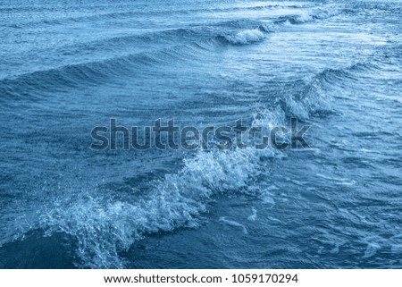 Surface sea water with waves and ripples