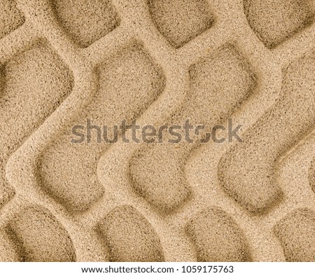 Tyre tracks in sand