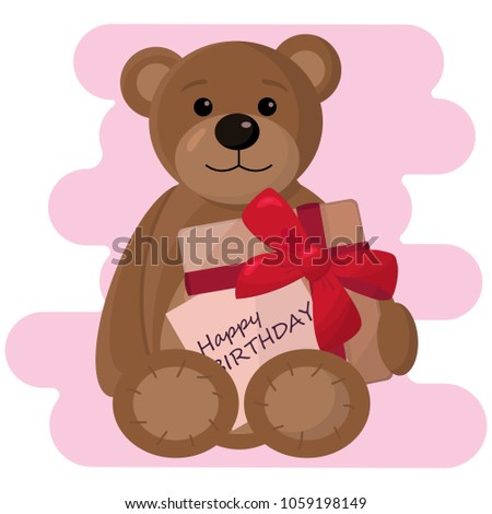 Teddy bear plush toy holding a gift box with a bow a card "happy birthday" on pink background