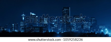 Calgary downtown panorama at night in Alberta, Canada. Royalty-Free Stock Photo #1059258236