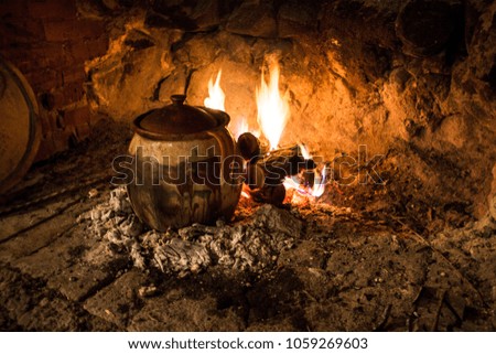 cooking food in the fireplace