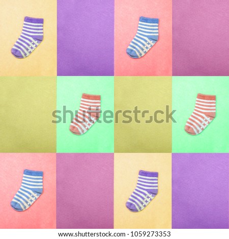Socks for children. View from above. Multi-colored striped socks on pink, mustard, purple, violet and green backgrounds. Abstract seamless texture in the style of pop art.
