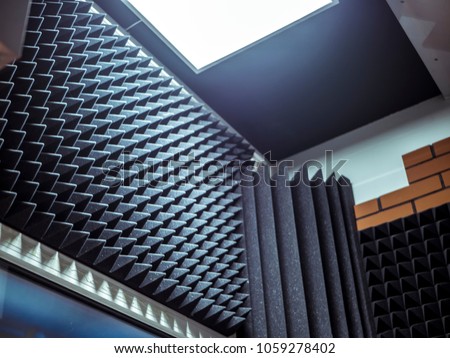 acoustic foam on the wall in the music studio Royalty-Free Stock Photo #1059278402