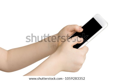 Kid holding blank mobile phone, cutout. Child hand with modern smartphone, white isolated background, copy space on screen