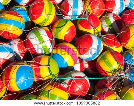 This balls are one of the most popular toys in Guatemala. Anciently the were made of pig´s guts, in the present are made of Guatemalan rubber and painted in cheerful colors. Find them in markets. Royalty-Free Stock Photo #1059305882