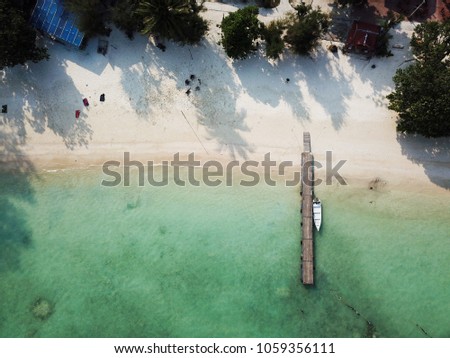 Aerial view of Teluk Dalam Beach of Perhentian Island, Terngganu Malaysia. This beautiful island is a prime location for traveller who loves scuba diving, snorkeling or just spending time to relax.