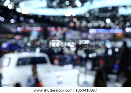 Background bokeh in car show in blur