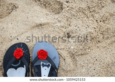 Flip Flops on a Sandy Beach on Summer Vacation.
