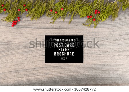 diary post card flyer Christmas composition. Christmas gift, pine cones, fir branches on wooden white background. Flat lay, top view