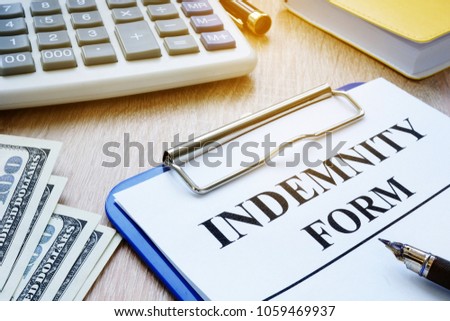 Indemnity form, pen and money. Insurance concept. Royalty-Free Stock Photo #1059469937