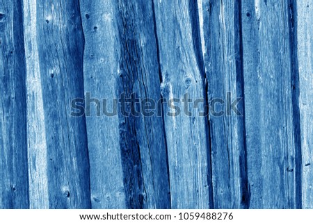 Wooden fence pattern in navy blue tone. Abstract background and texture for design.