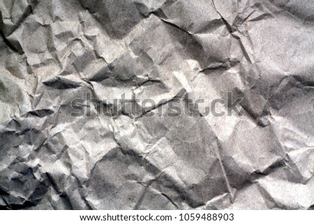 Old paper with wrinckles. Abstract background and texture for design.