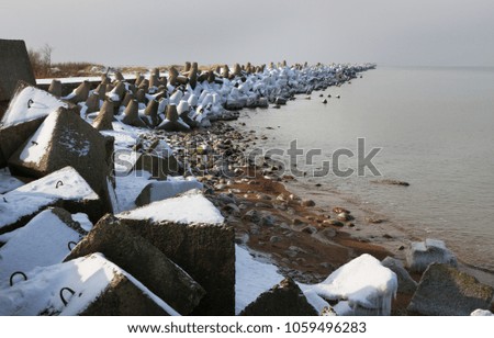Last snow on shore of the Baltic sea.