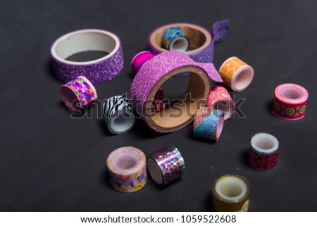 decorative tape on a black background Royalty-Free Stock Photo #1059522608
