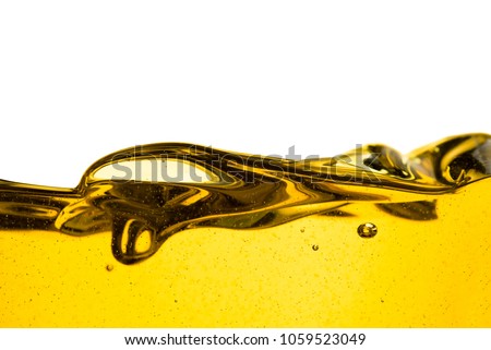 Pouring oil car motor or olive vegetable cooking and bubble isolated on white background  Royalty-Free Stock Photo #1059523049
