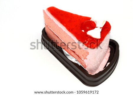 Sweet cherry on strawberry cake isolated white background