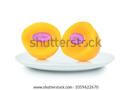 Marian Plum in white plate on white background