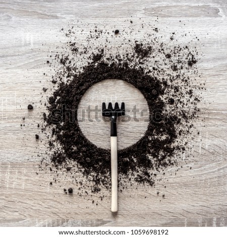 wooden background concept earth piled circle dish rake fork texture landing center 