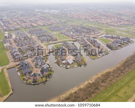 Sky photo of houses in the city Zeewolde