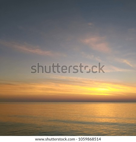 A view of a picturesque seascape at dawn