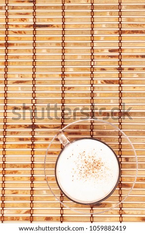 Series.cappuccino cup on bamboo mat