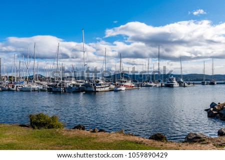 Scenic view of a yacht port.
Wrest point marina, Hobart, Australia, cloudy sky in background.
 Royalty-Free Stock Photo #1059890429