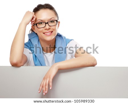 A young woman with a blank isolated on white background