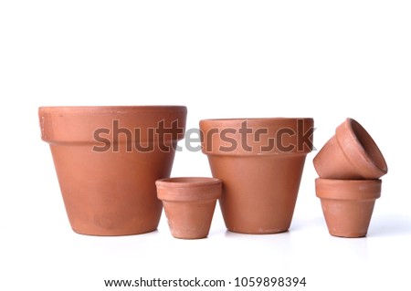 little and bid  terra cotta pots isolated on white background Royalty-Free Stock Photo #1059898394