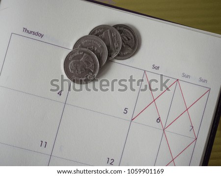 4 Thai Baht coin on month planner