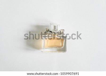 Perfume bottles in different sizes shapes on white background concept choice