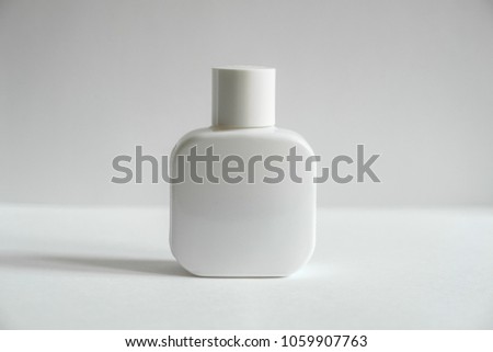 Perfume bottles in different sizes shapes on white background concept choice