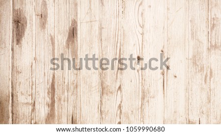 Light brown wooden wall, detailed background photo texture. Wood plank fence close up.