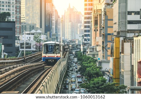 BTS Sky Train is running in downtown of Bangkok.  Sky train is fastest transport mode in Bangkok Royalty-Free Stock Photo #1060013162