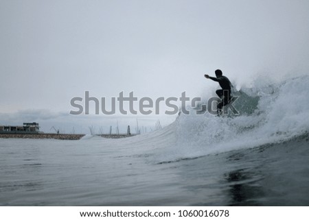 Man surfing a wave 