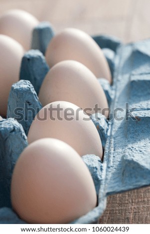 beautiful big white organic eggs in tray