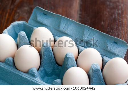 beautiful big white organic eggs in tray