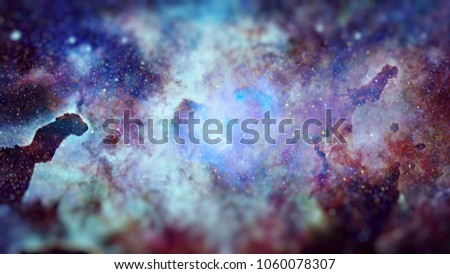 Nebula and stars in deep space. Science fiction art with small DOF. Elements of this image furnished by NASA.