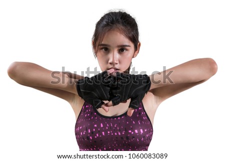 Portrait of young beautiful fitness girl wearing gloves and ready for gym exercise