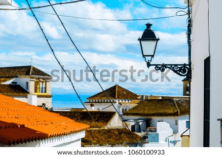 old stylish street lamp illuminating the Spanish street, a characteristic element of traditional street architecture, decor