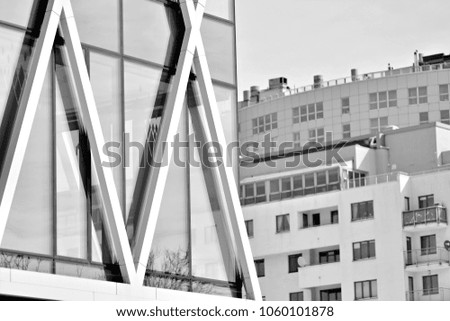 Modern city office building exterior. Black and white.
