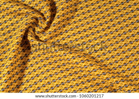 Fabric cotton is brown with a pattern of circles. Smooth and chic but still on the wild side, do not miss this Python Printed Stretch Cotton Sateen With a smooth crisp hand this cotton shows diamonds