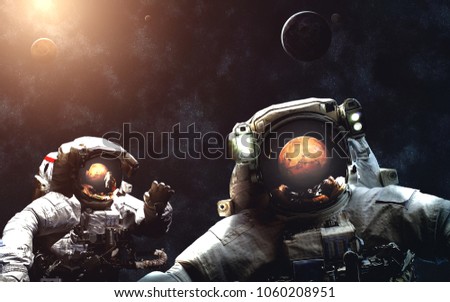 Arrival to Mars. Astronauts. Solar System. Image in 5K resolution for desktop wallpaper. Elements of the image are furnished by NASA
