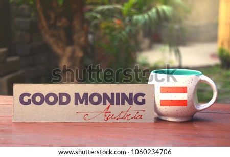 Austria flag on the tea cup with a good morning message