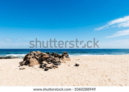 Scenic view of sea and desert landscape. Dunes of Corralejo