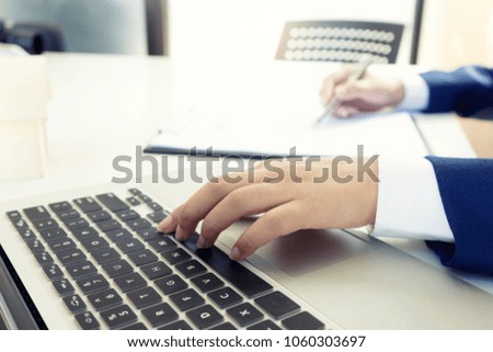 young business woman work with computer paper work with rent house business