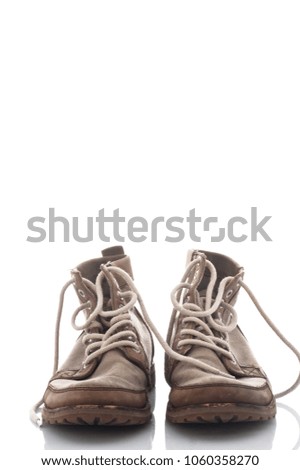 Old shoes on white background