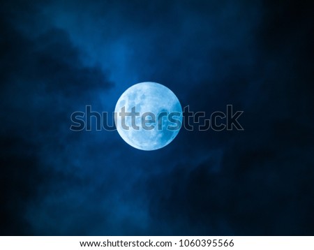 The Full Moon with Cloud in The Blue Night